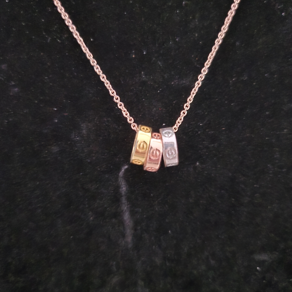 Elegant Tri-Color Necklace with Interlocking Rings